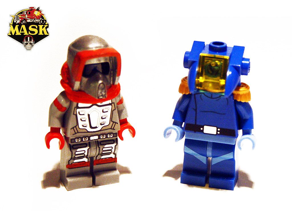 Two LEGO M.A.S.K. minifigures in red and blue spacesuits with helmets and detailed torso printing.