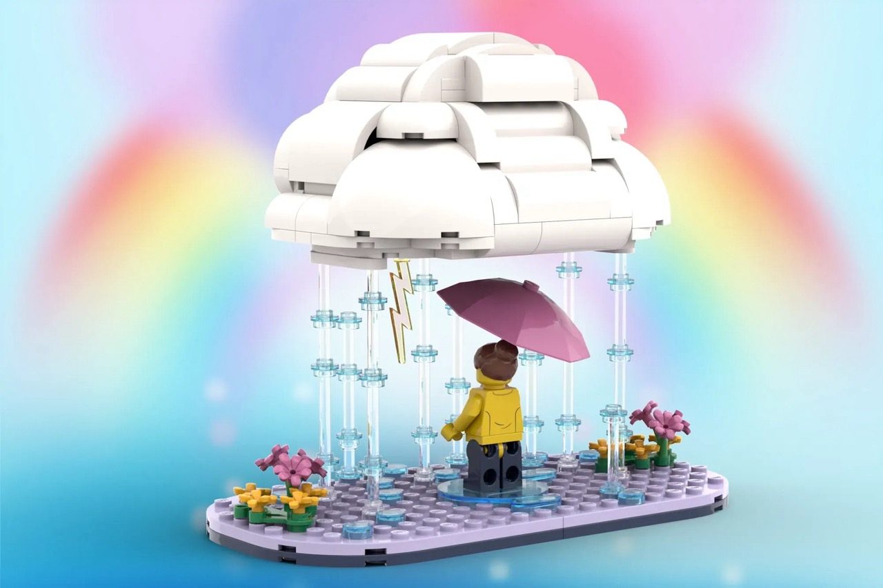 LEGO cloud set with minifigure holding pink umbrella in rain, surrounded by flowers and rainbow details.