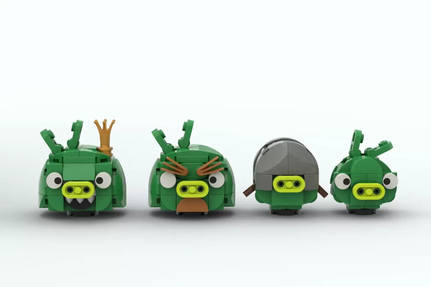 Four LEGO Angry Birds characters with green bodies, yellow snouts, and articulated cactus-like limbs in different poses.