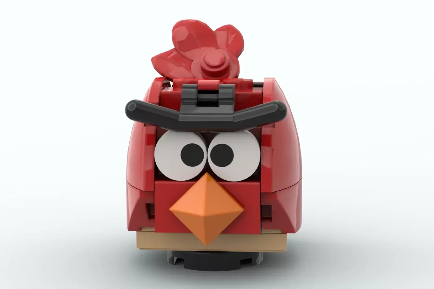 LEGO Angry Birds red bird character with white eyes, orange beak, black eyebrows, and tan base piece.