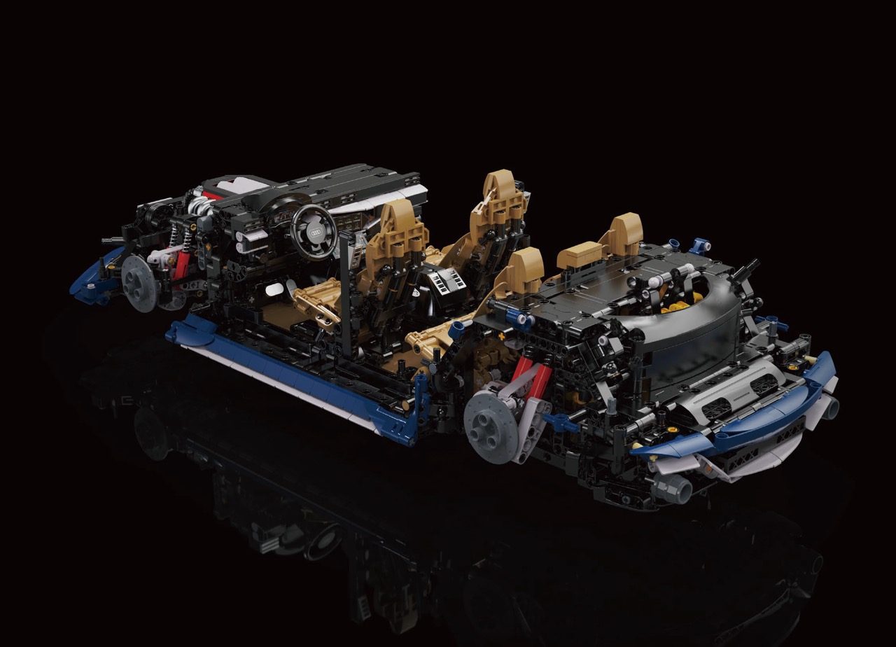 CaDA Audi RS6 Avant LEGO model displaying detailed engine and interior components against black background.