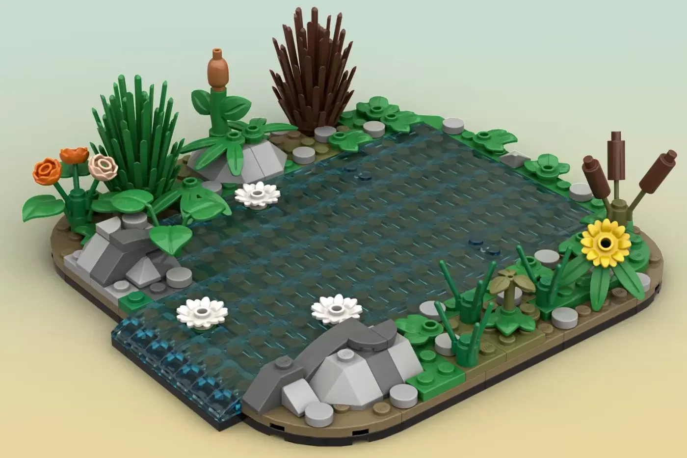LEGO pond diorama with colorful flowers, water lilies, cattails, rocks, and gray structures surrounded by green vegetation.