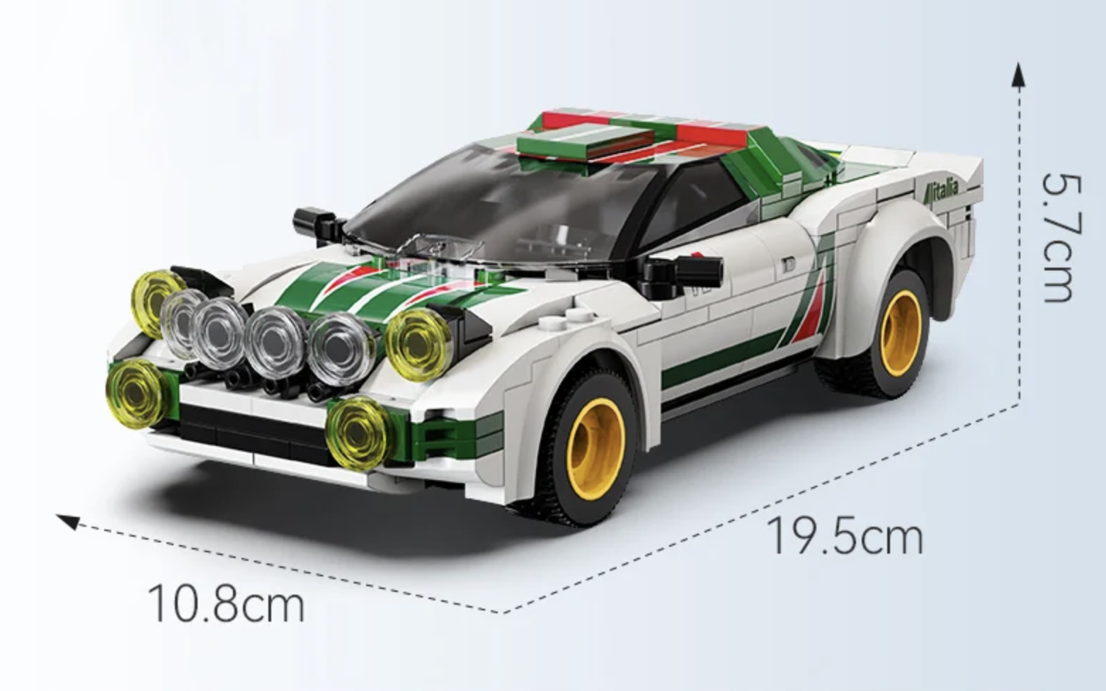 CaDA Lancia Stratos HF rally car model with white and green livery, shown with dimensions 19.5cm x 10.8cm x 5.7cm.