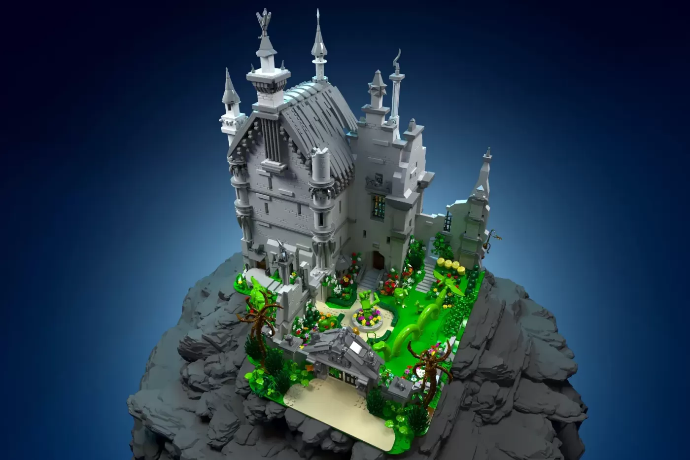 LEGO castle on rocky base with white Gothic spires, green grounds, gardens, and detailed architectural elements.