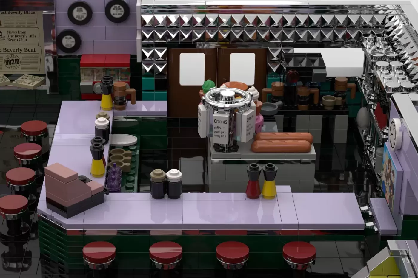 LEGO Peach Pit diner recreation with counter seating, kitchen area, and classic 1990s aesthetic details.