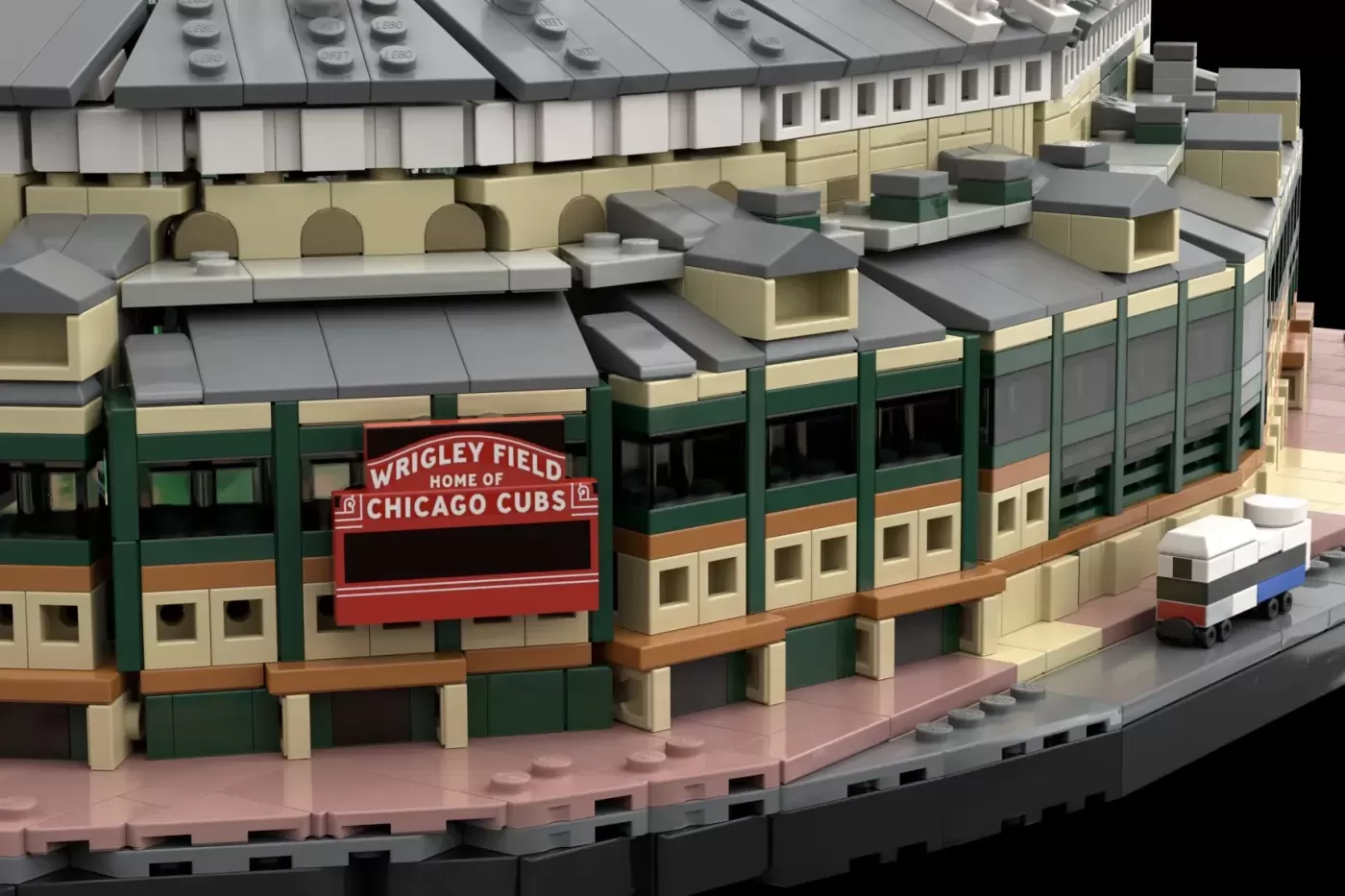 LEGO brick model of Wrigley Field featuring green and cream exterior, iconic red