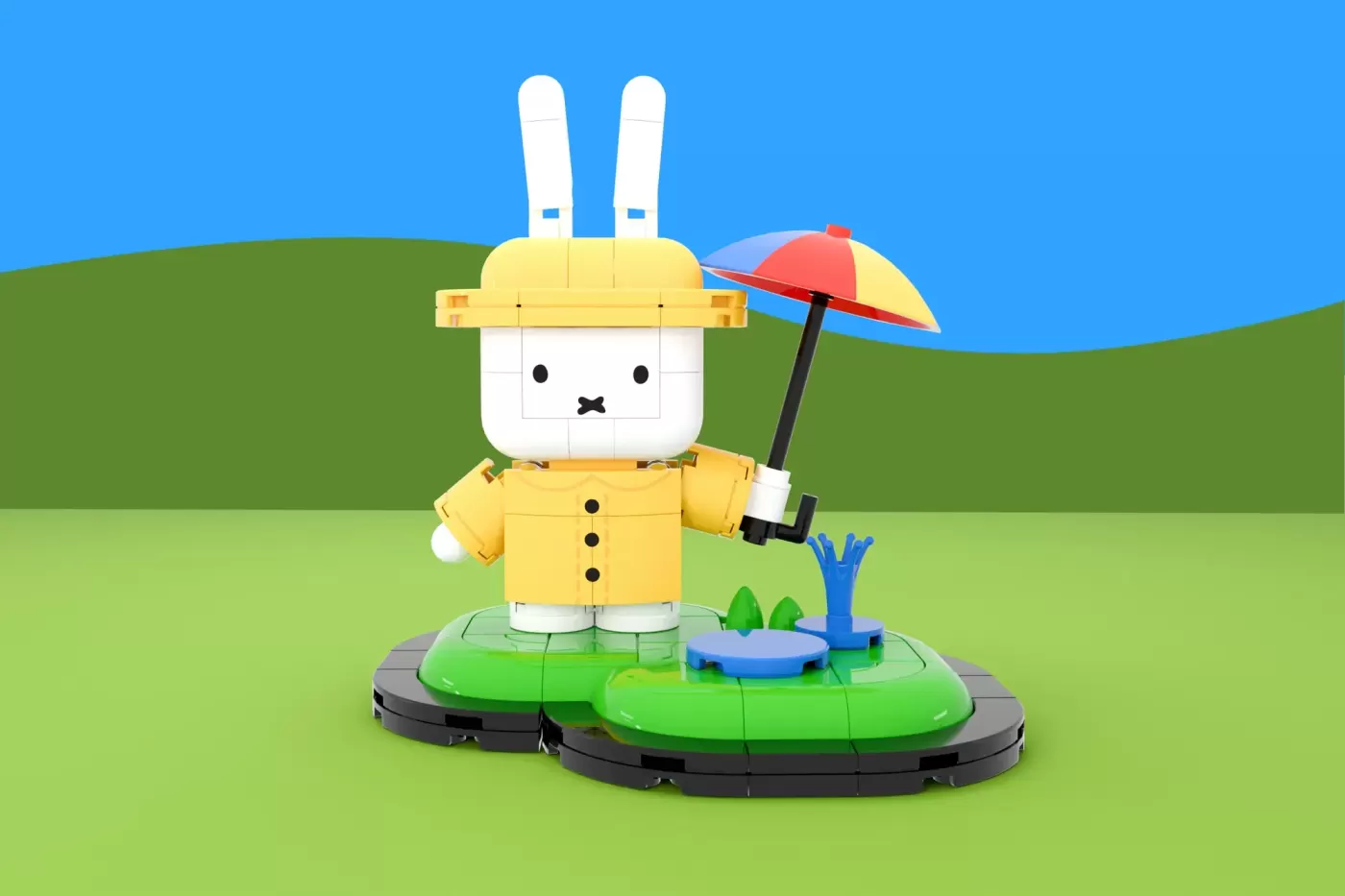 LEGO Miffy bunny figure in yellow raincoat holding umbrella on green baseplate with pond and plants.