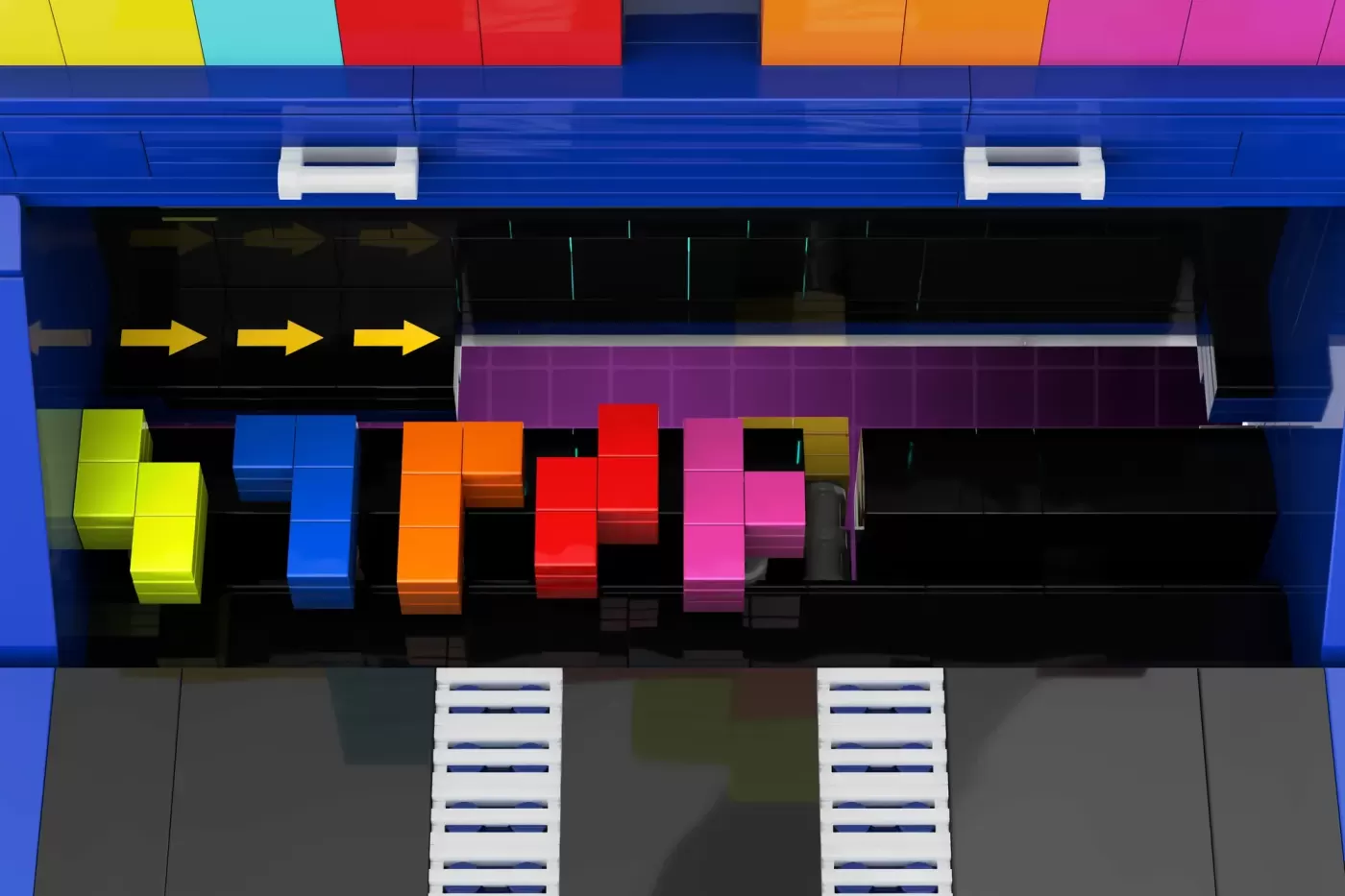Colorful LEGO Tetris display with falling blocks in yellow, blue, orange, red, and pink against blue storefront backdrop.