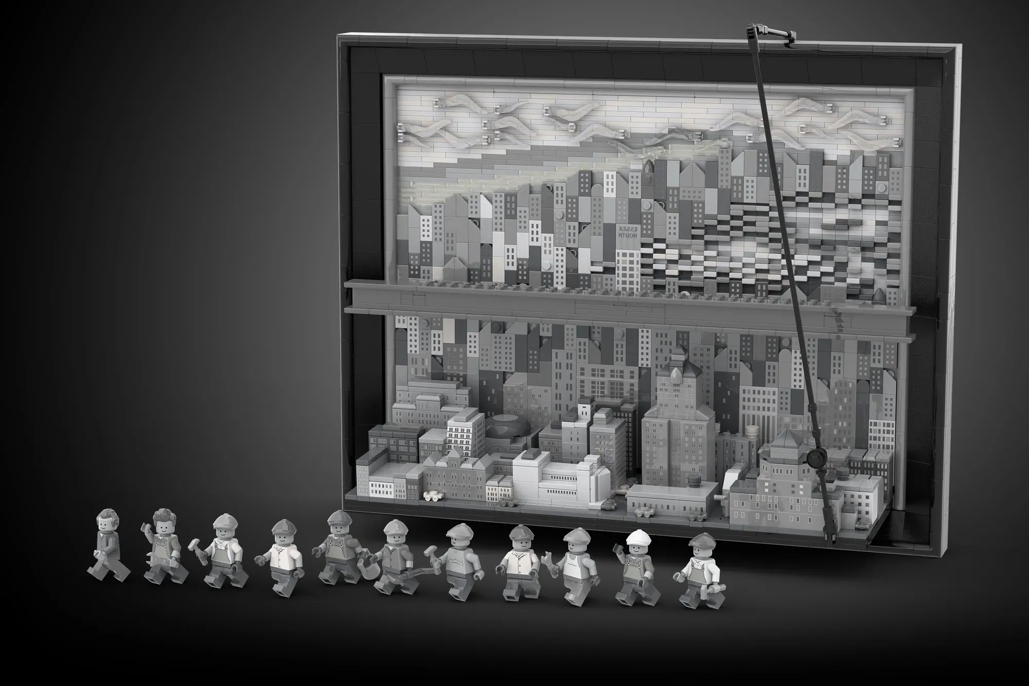 LEGO recreation of 1932 "Lunch Atop a Skyscraper" photo with 10,000 bricks, featuring minifigures and detailed cityscape d…