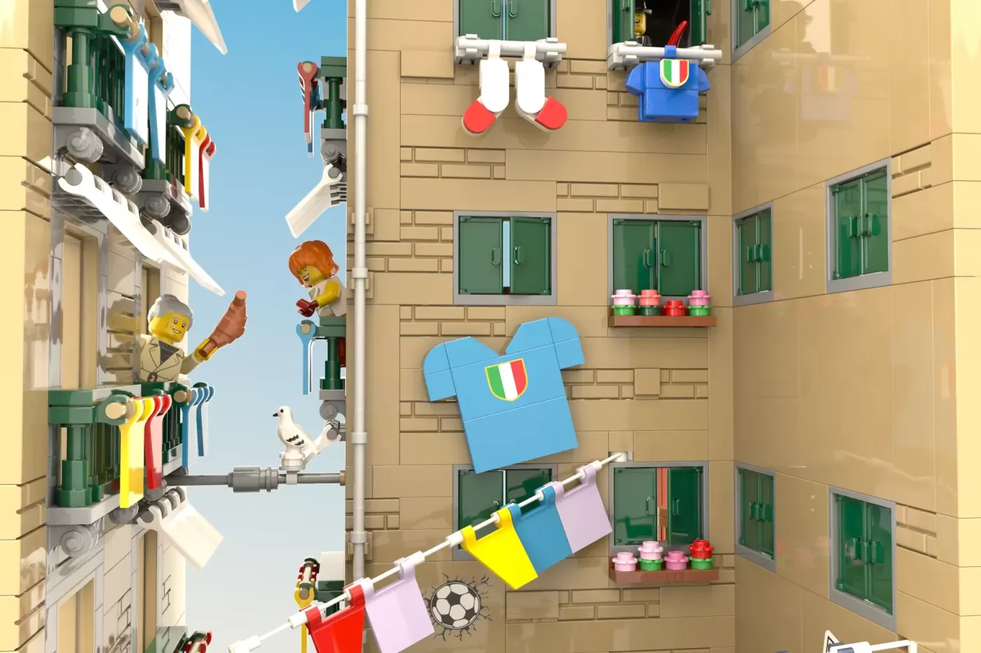 LEGO Quartieri Spagnoli courtyard with Italian flags, minifigures, flower boxes, and soccer ball decoration.
