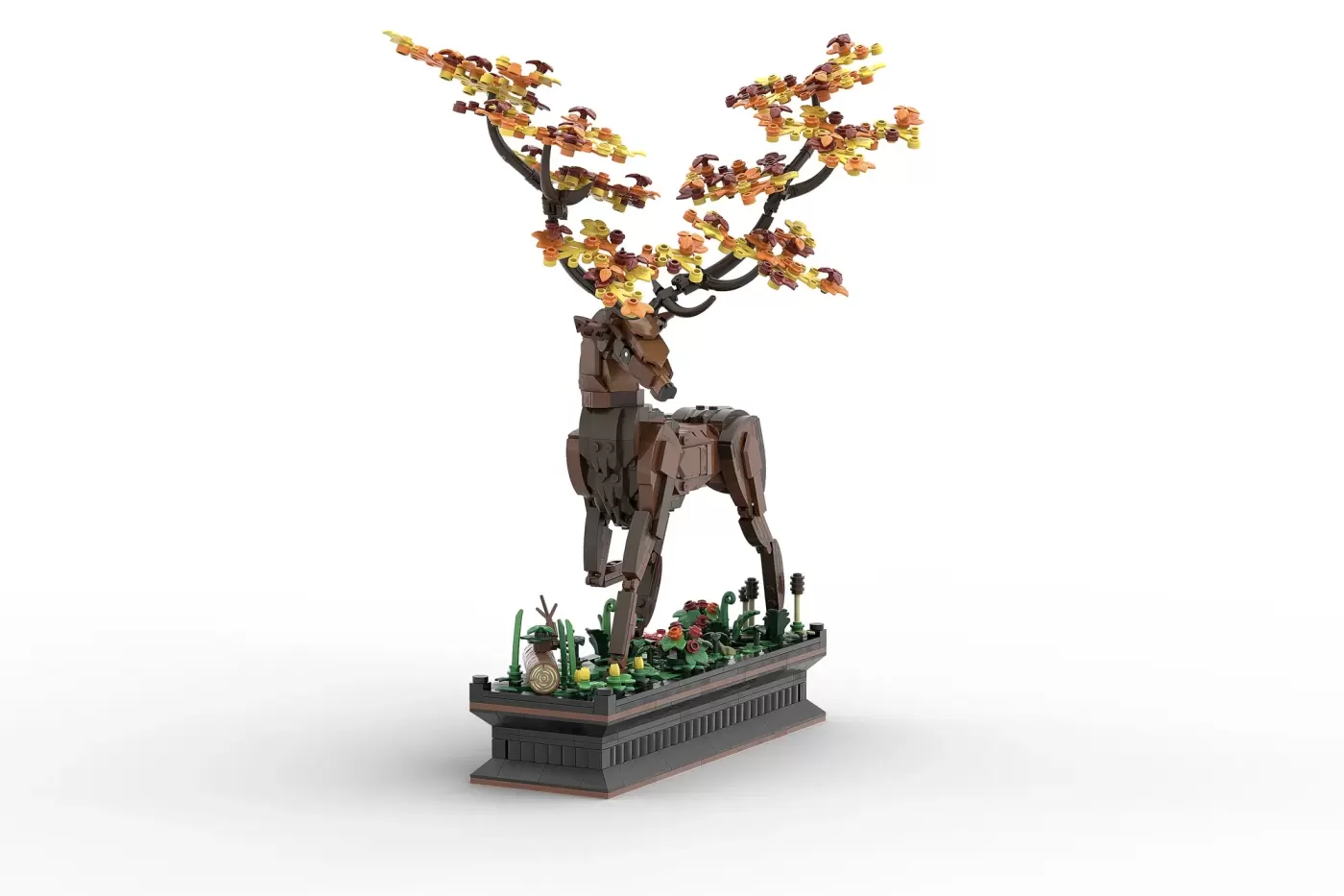 LEGO stag sculpture with articulated antlers in autumn gold and brown, standing on decorative base with foliage.