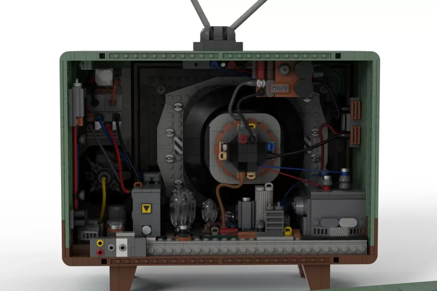 LEGO Classic TV set with exposed internal components including vacuum tubes, circuits, and wiring visible through transpar…