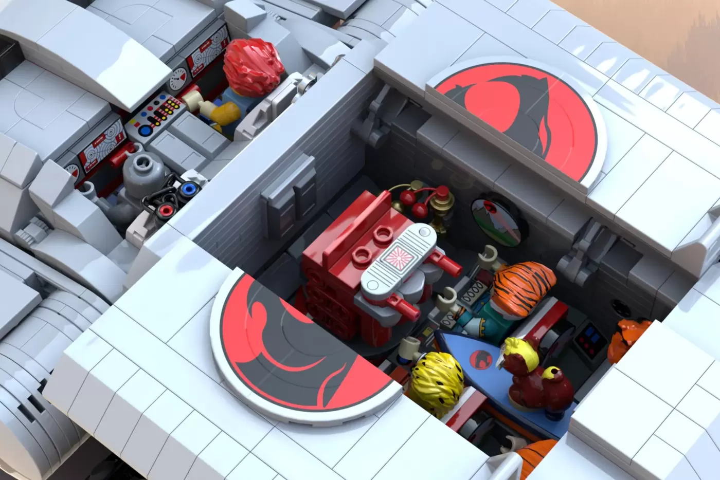 LEGO ThunderCats MOC interior with red engine, minifigures, and iconic red logo on white baseplate.