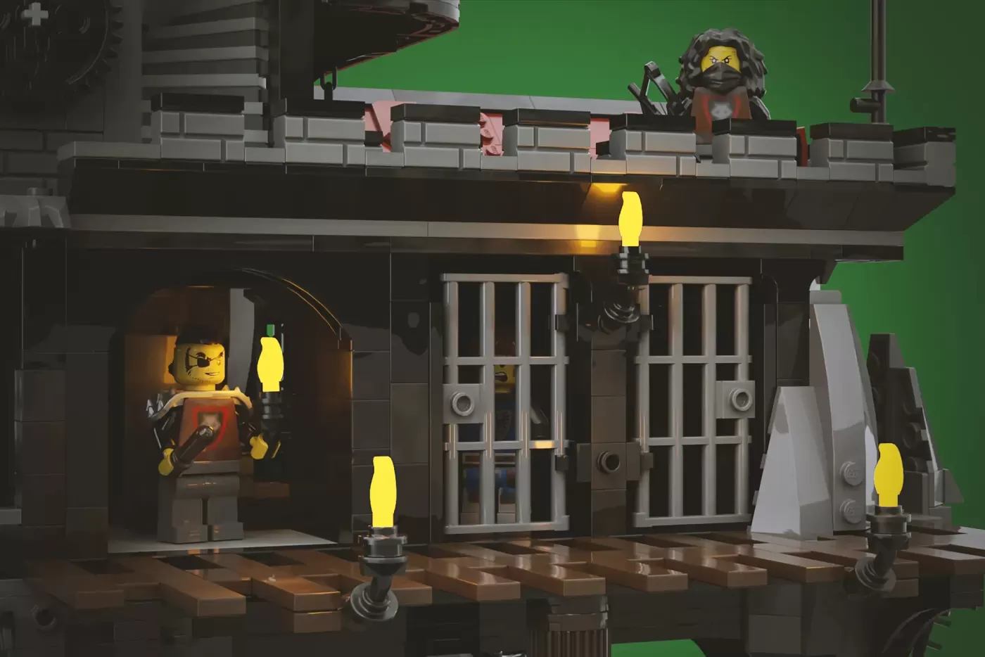 LEGO Wolfpack Fanghold castle entrance with stone fortress, torches, minifigures, and wolf sculpture details.