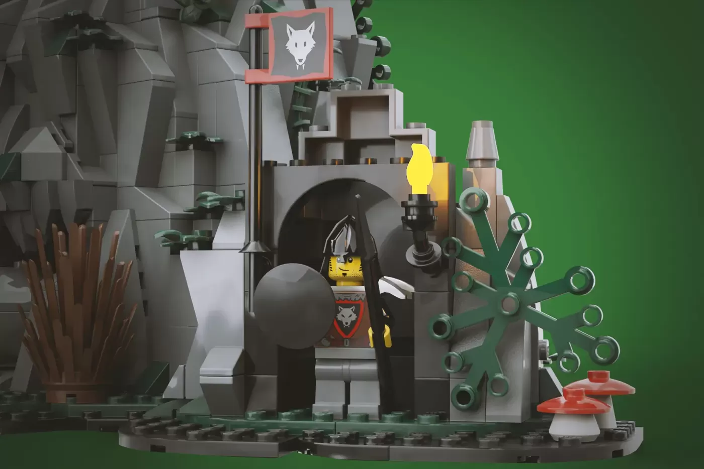 Detailed LEGO Wolfpack Fanghold castle entrance with stone wolf sculpture, minifigures, and green base.